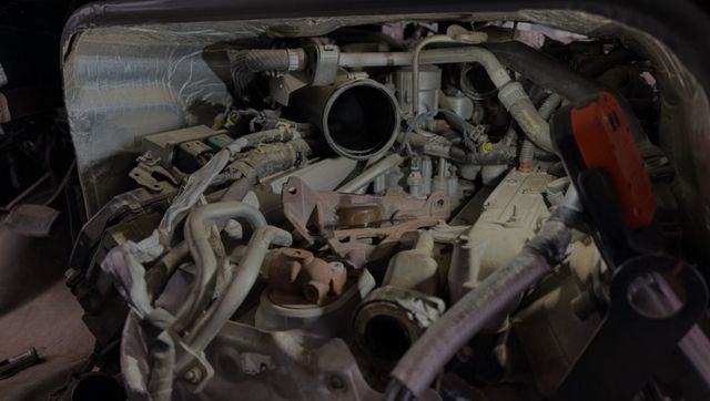 Engine bay opened up for diagnosis at Elite Diesel & Auto Works