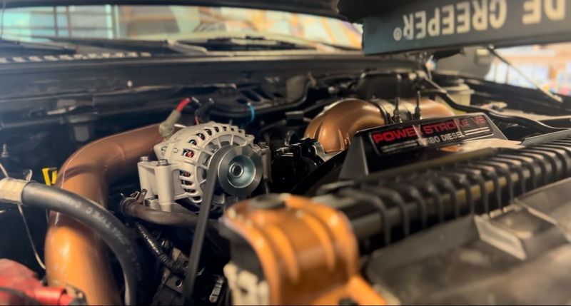 Ford Power Stroke diesel engine under repair at Elite Diesel & Auto Works in Oak Grove