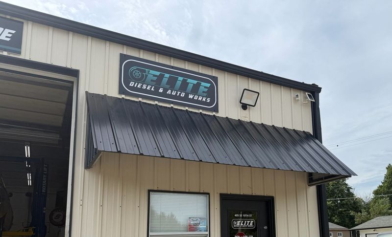 Elite Diesel & Auto Works sign above the service bays at the Oak Grove shop